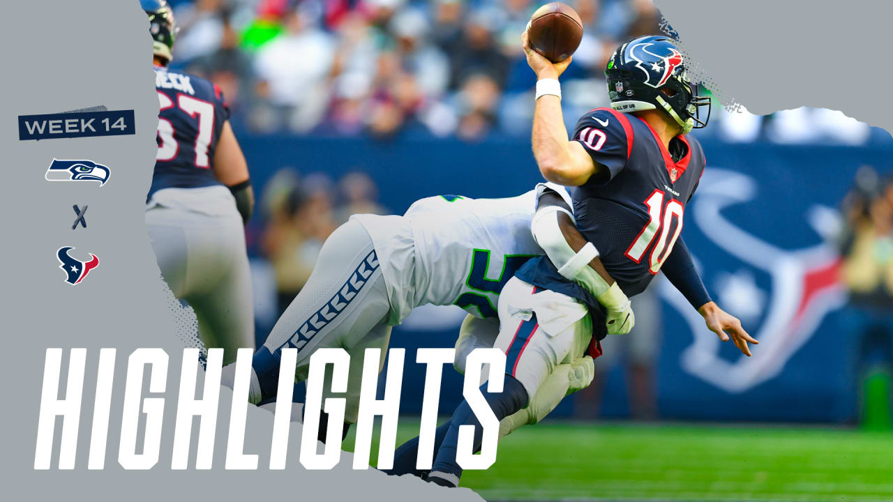 Houston, TX, USA. 12th Dec, 2021. Seattle Seahawks defensive end Darrell  Taylor (52) sacks Houston Texans quarterback Davis Mills (10) during the  4th quarter of an NFL football game between the Seattle