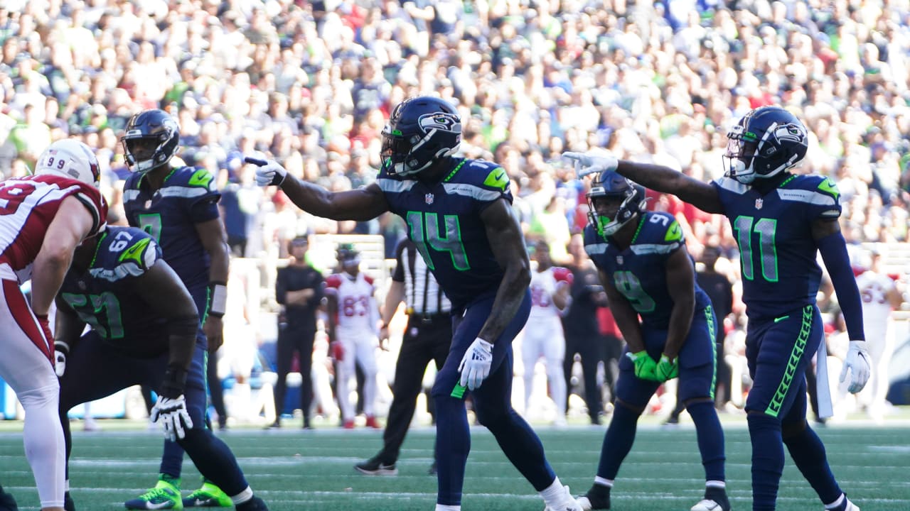 Seahawks LB Darrell Taylor runs onto the field after an interception,  giving Seattle a real 12th man 