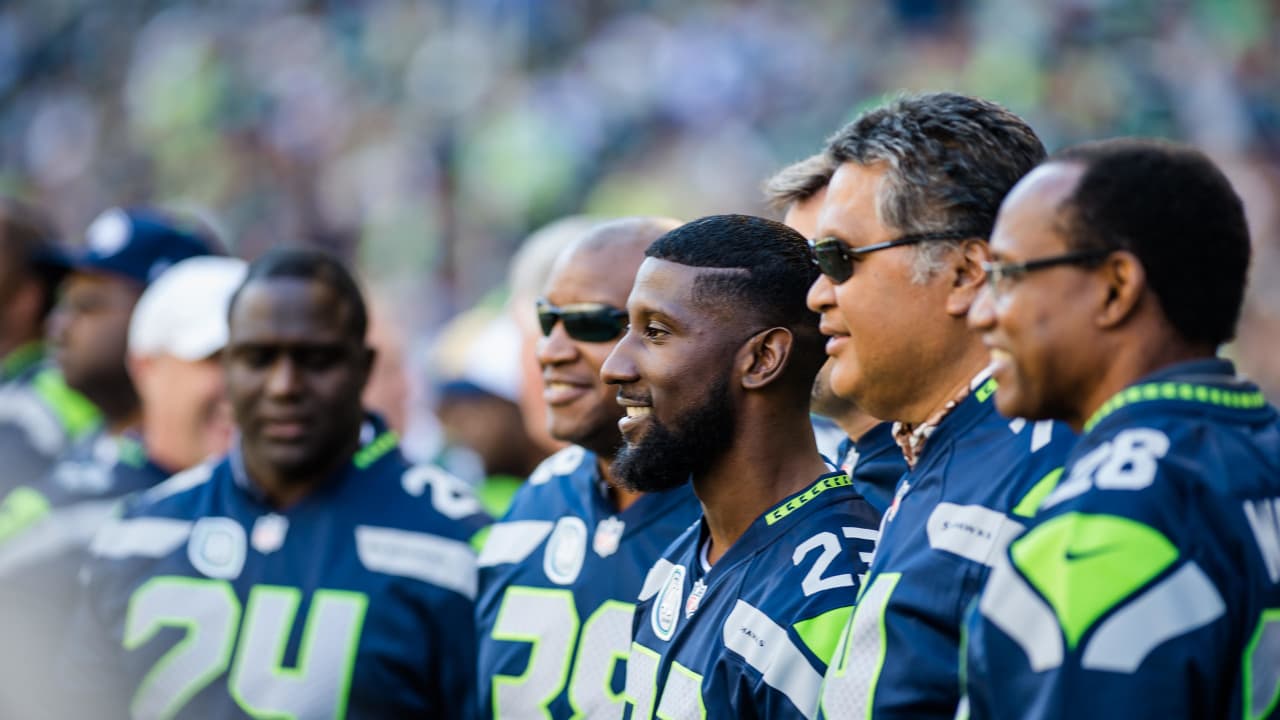 Former Seattle Seahawks quarterback Warren Moon is recognized during a  halftime celebration of the 40th anniversary of the Seattle Seahawks  Chicago Bears during an NFL football game against the Chicago Bears, Sunday