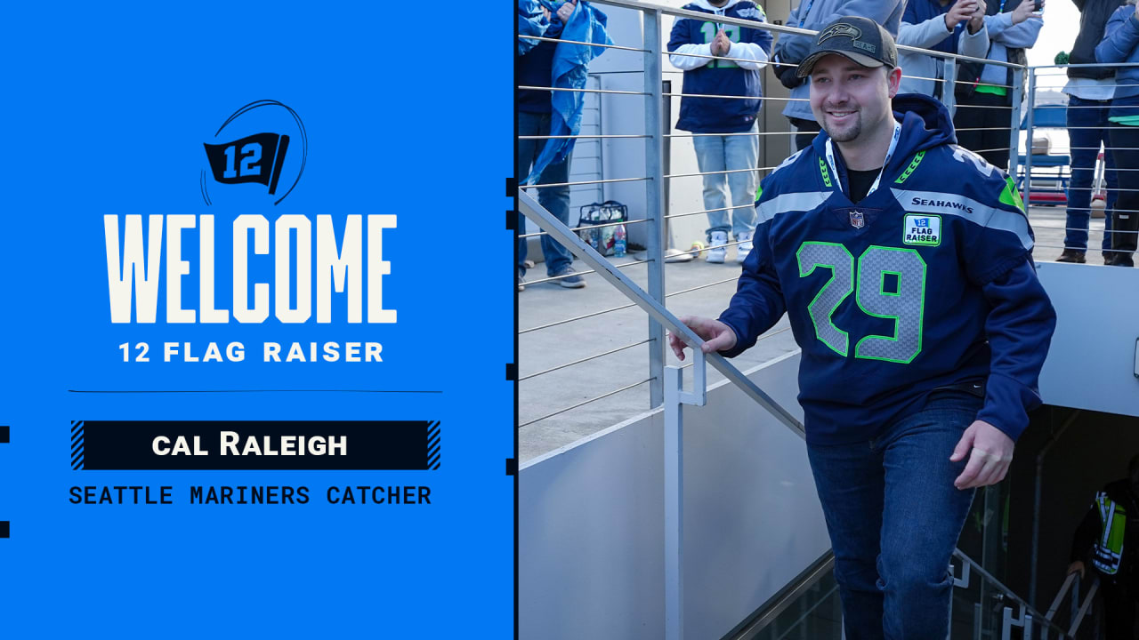 PHOTOS: Seattle Mariners Catcher Cal Raleigh Raises The 12 Flag