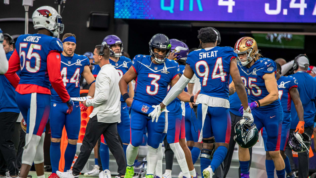 NFC cornerback Trevon Diggs of the Dallas Cowboys celebrates with Seattle  Seahawks Russell Wilson after competing in the Best Catch event at the 2022  Pro Bowl Skills Showdown Wednesday, February 2, 2022