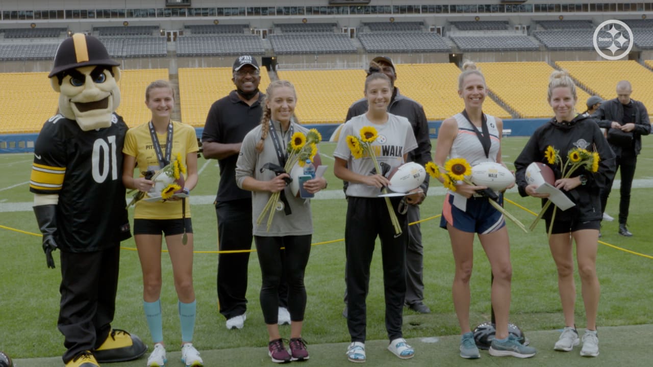 Young football fans flock to Rod Woodson's camp