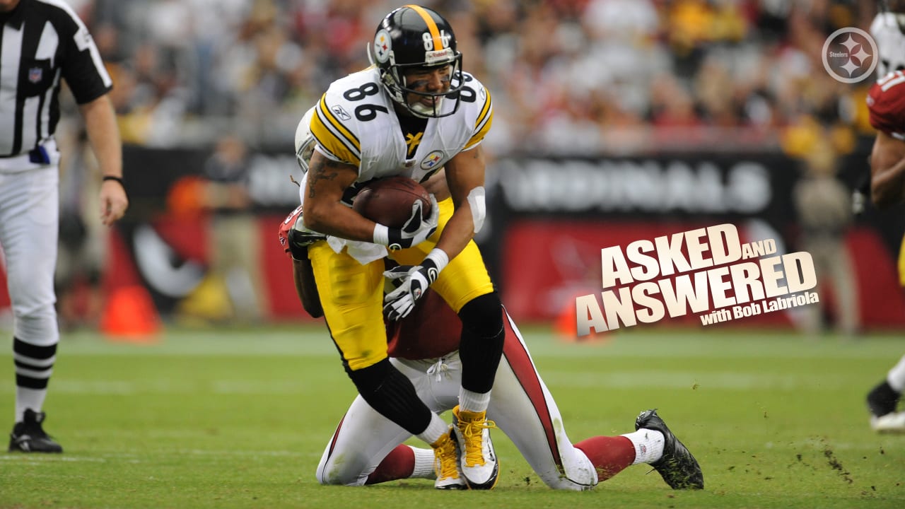 Pittsburgh Steelers Hines Ward (86) pulls in a pass from quarterback Ben  Roethlisberger during the first