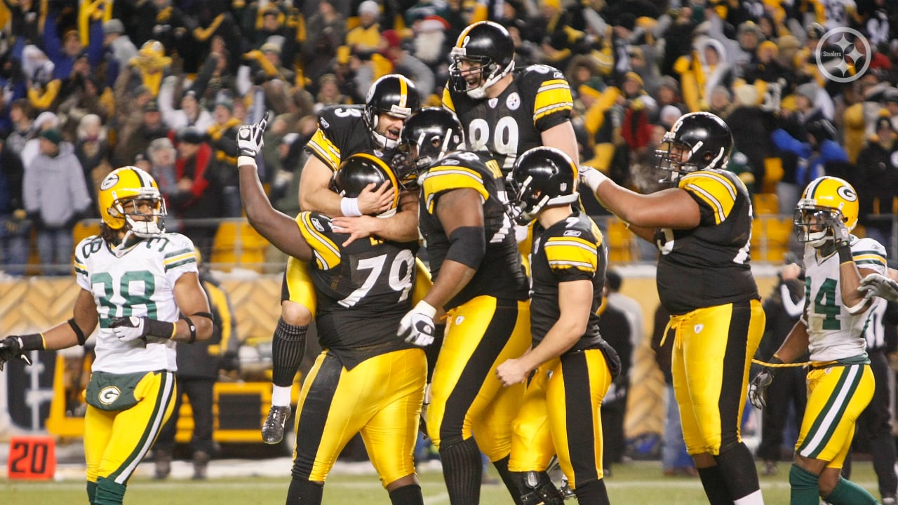 Super Bowl MVP Pittsburgh Steelers Santonio Holmes holds the Vince Lombardy  Trophy after his team defeated