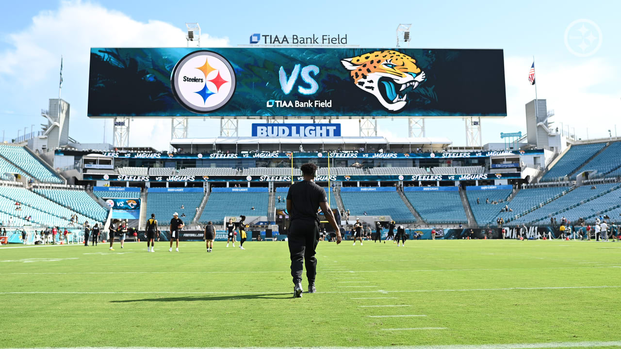 Pittsburgh Steelers head coach Mike Tomlin, center, calls out instructions  from the sideline during the second half of a preseason NFL football game  against the Jacksonville Jaguars, Saturday, Aug. 20, 2022, in