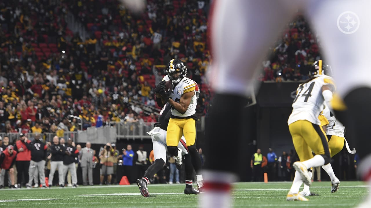 Pittsburgh Steelers wide receiver Steven Sims (82) runs the ball during the  first half of an NFL football game against the Atlanta Falcons, Sunday,  Dec. 4, 2022, in Atlanta. The Pittsburgh Steelers