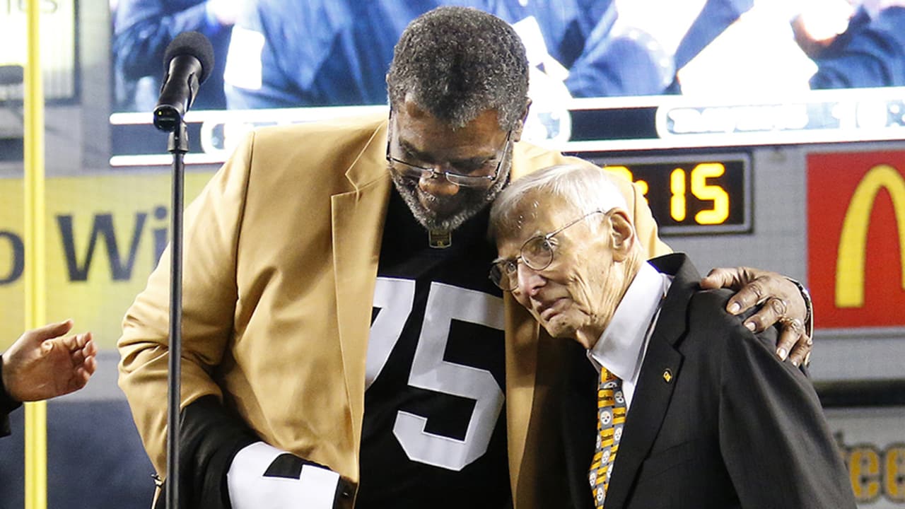 Mean Joe Greene showing off the rare all-white Pittsburgh Steelers