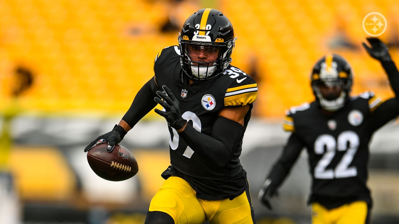 Pittsburgh Steelers free safety Minkah Fitzpatrick (39) celebrates with  wide receiver JuJu Smith-Schuster (19) on the sideline after scoring a  touchdown on an intercepted pass from Cleveland Browns quarterback Baker  Mayfield during