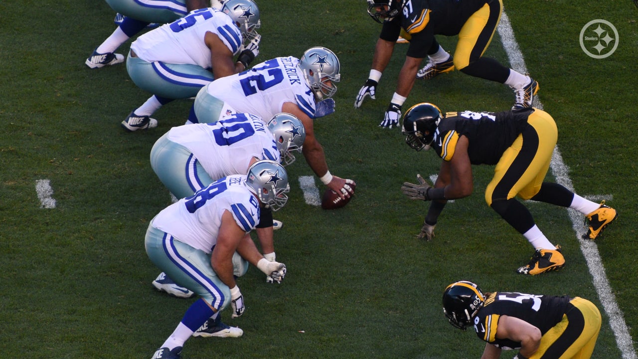 Dallas Cowboys quarterback Tony Romo (9) calls an audible at the line in  the NFL football game between the San Diego Chargers and Dallas Cowboys at  Cowboys Stadium in Arlington, Texas. The