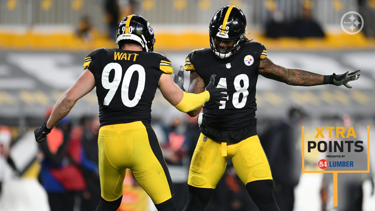 Cincinnati Bengals Michael Johnson holds on the jersey and sacks Pittsburgh  Steelers quarterback Ben Roethlisberger for a lost of eight yards in the  second quarter at Heinz Field in Pittsburgh, Pennsylvania on