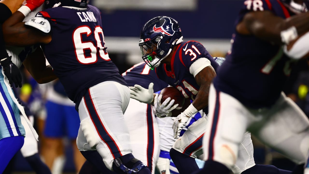 Arlington, United States. 11th Dec, 2022. Houston Texans running back  Dameon Pierce (31) runs over Dallas Cowboys safety Malik Hooker (28) during  the NFL Football Game between the Houston Texans and the