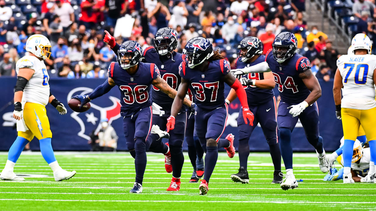 Houston Texans defensive back Jonathan Owens (36) walks onto the