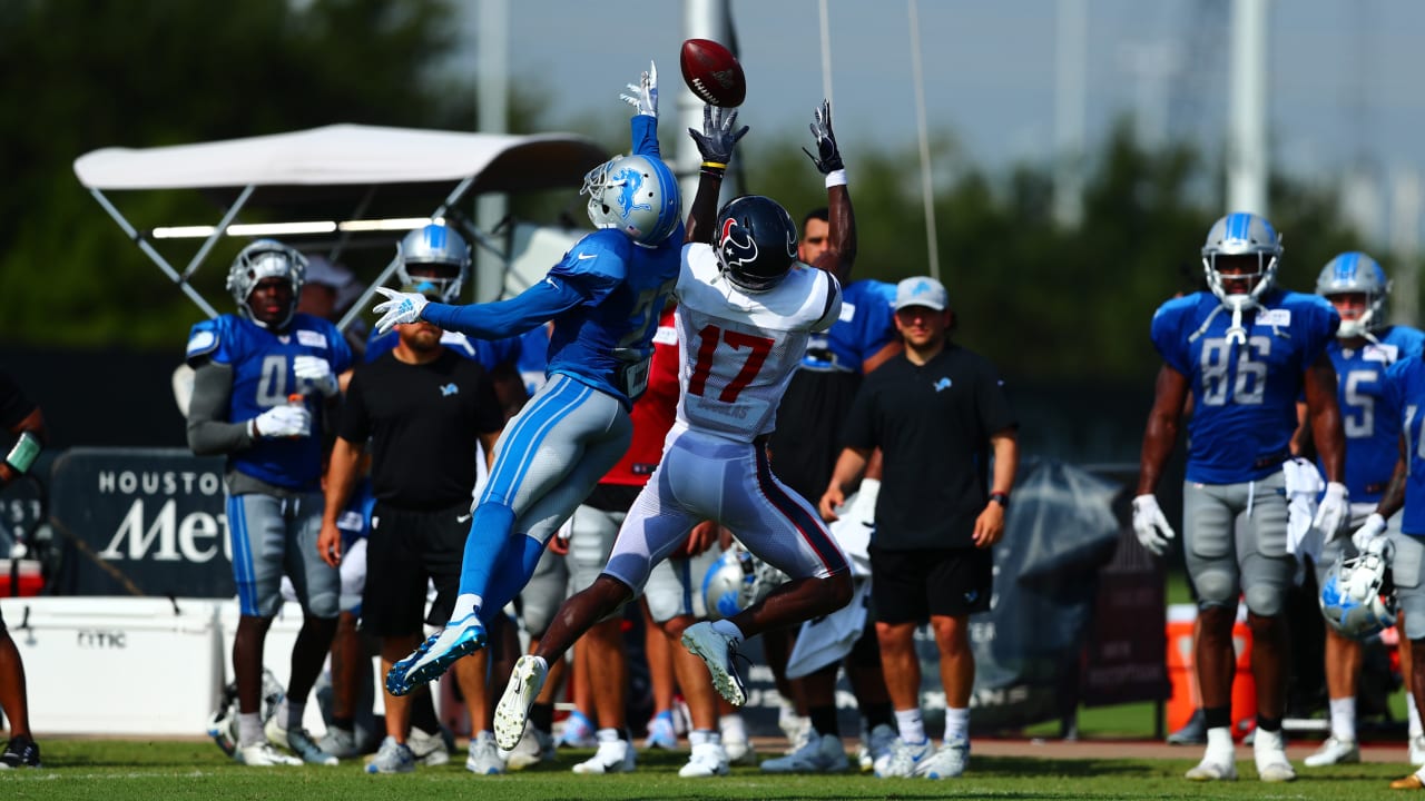 Houston Texans wide receiver Chad Hansen (17) hands the ball off