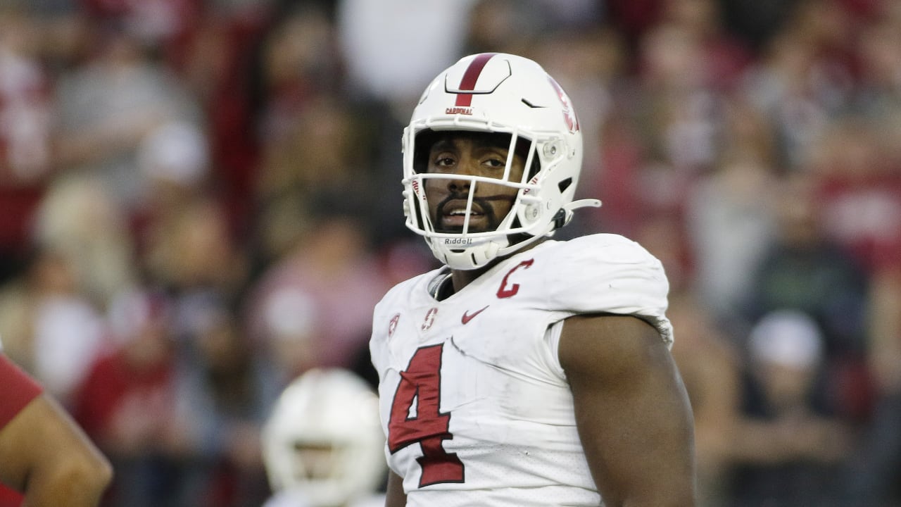 Thomas Booker says his face lit up when he received the call from the  Houston Texans during Day 3 of the 2022 NFL Draft on Saturday.