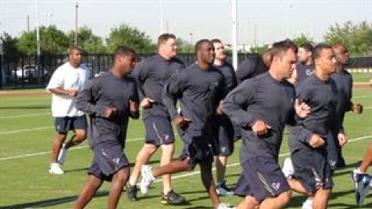 Texans hit the field for conditioning