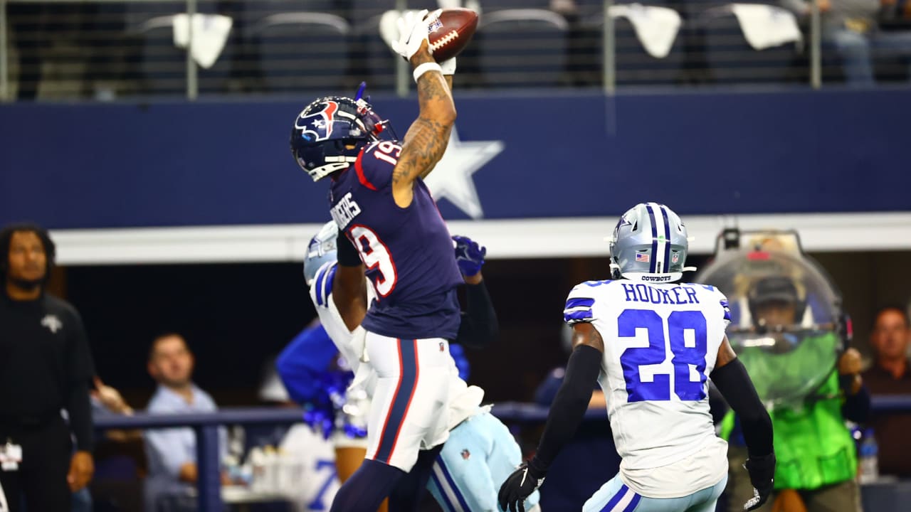 Houston Texans running back Darius Anderson (30) takes a handoff from  quarterback Jeff Driskel (6) during an NFL football training camp practice  Friday, Aug. 5, 2022, in Houston. (AP Photo/David J. Phillip