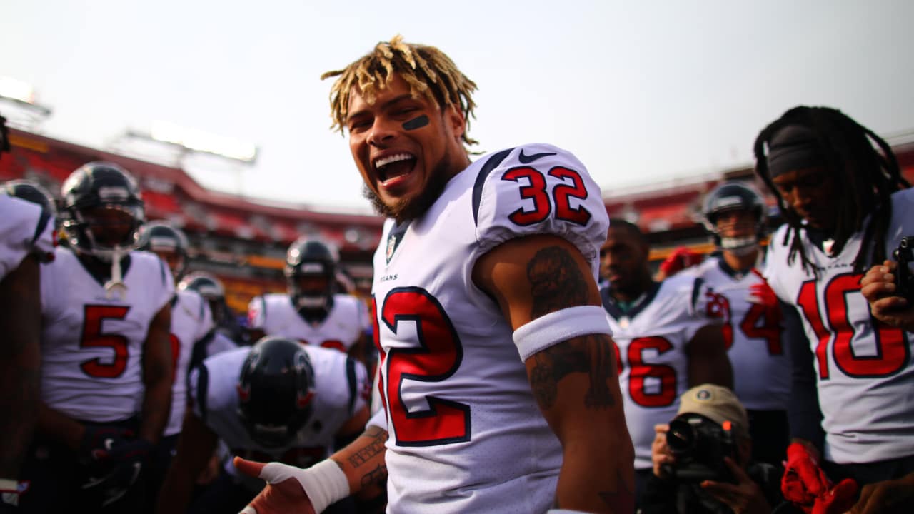 Tyrann Mathieu hands out âDefense With Attitudeâ shirts