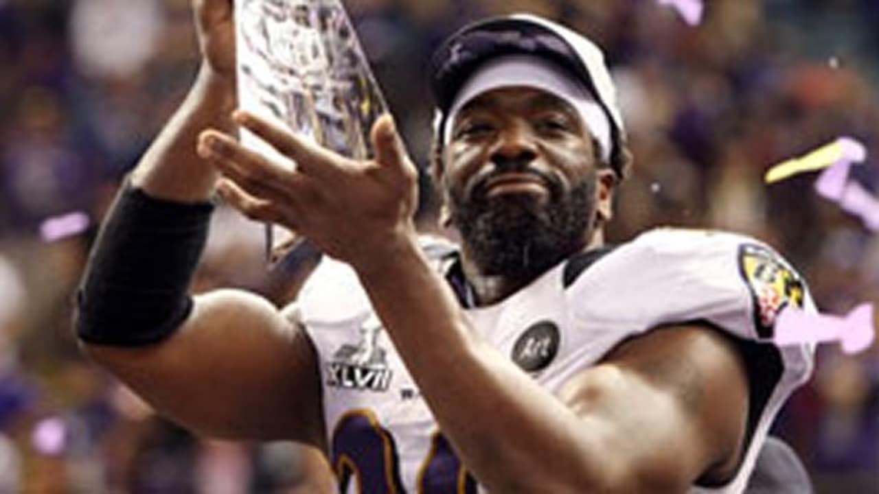 white and orange football gloves