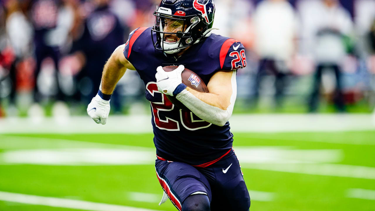 Houston Texans running back Rex Burkhead (28) warms up before an