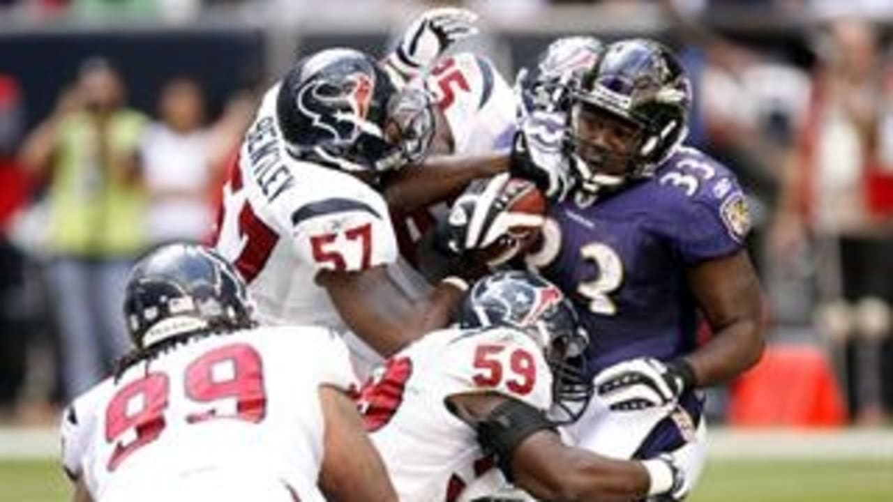 Photo: Ravens Todd Heap gains 4 yards against the Denver Broncos