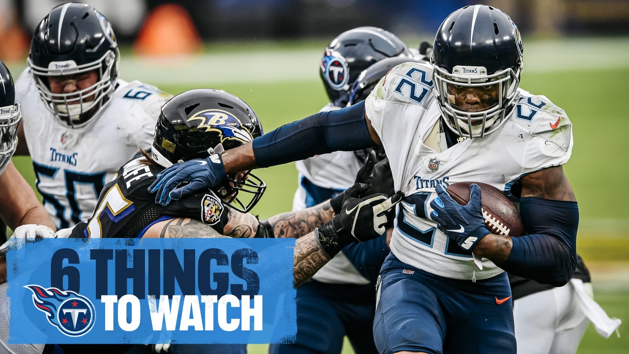 Tennessee Titans Harold Landry III tackles Baltimore Ravens quarterback  Lamar Jackson during overtime of an NFL