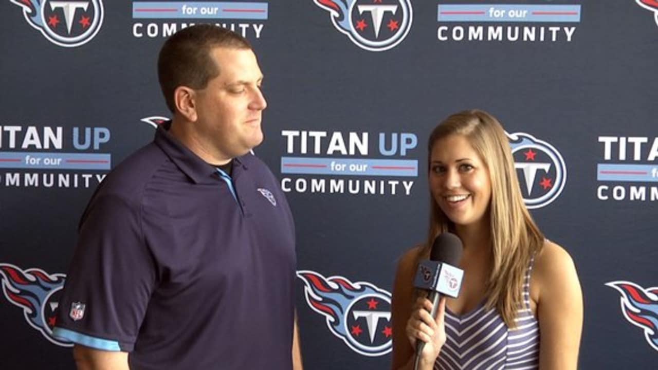 Tennessee Titans football outreach manager Josh Corey, left, escorts the  Fairview High School girls flag football team to watch the Tennessee Titans  practice during NFL football training camp Saturday, July 31, 2021