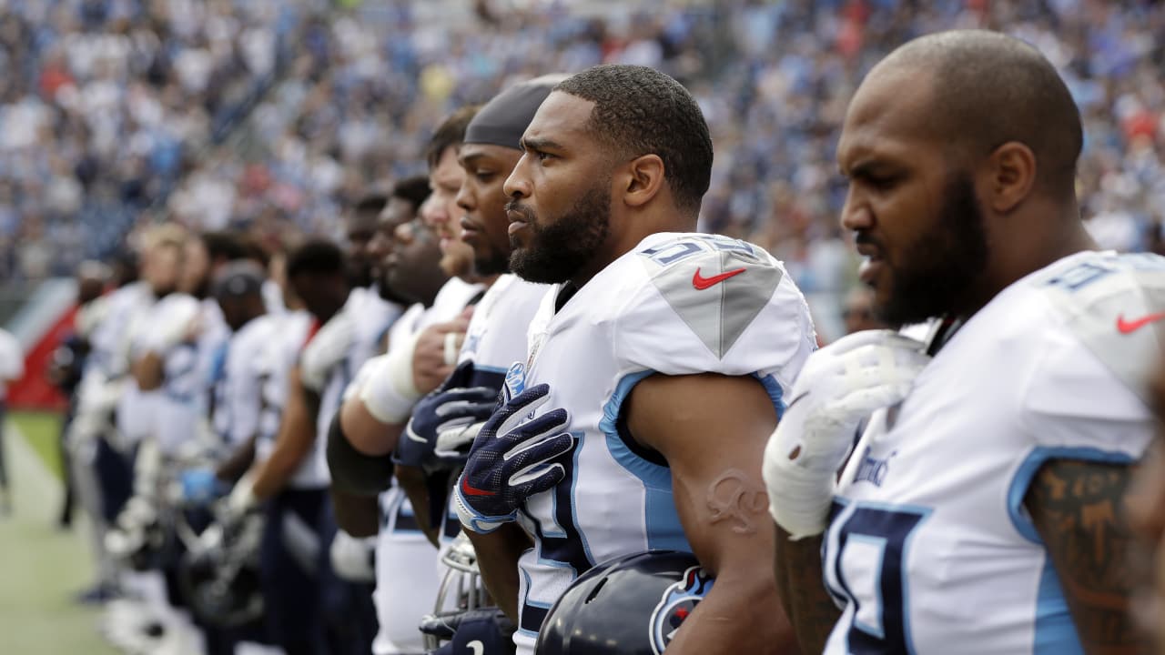 The Sword of Honor is moved to the field before the first half of an NFL  football game between the Tennessee Titans and the Jacksonville Jaguars,  Thursday, Dec. 6, 2018, in Nashville