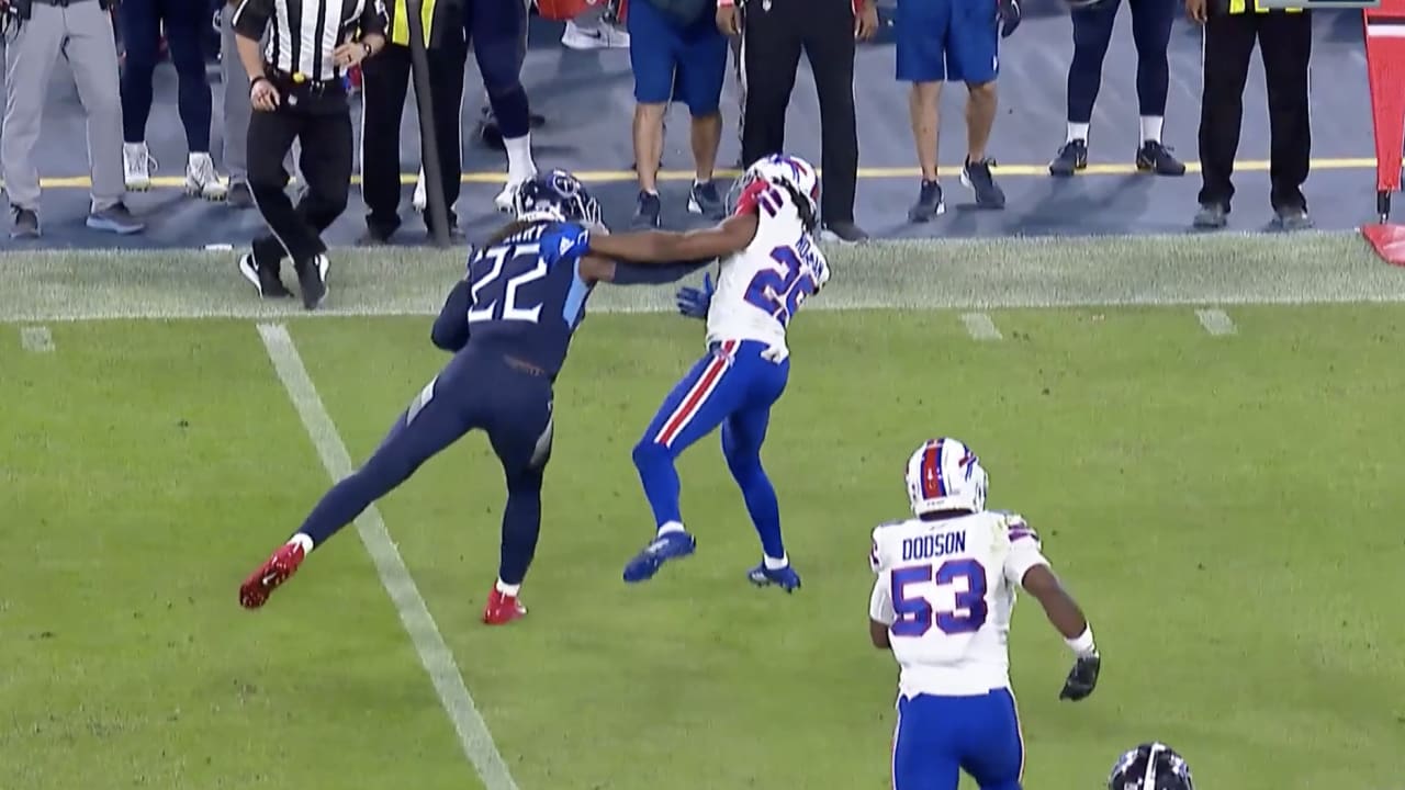 Derrick Henry tosses Josh Norman down during Bills-Titans game