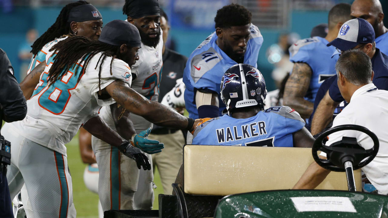 Tennessee Titans outside linebacker Akeem Ayers is taken off the field in  the first half of an NFL preseason football game against the Cincinnati  Bengals, Saturday, Aug. 17, 2013, in Cincinnati. (AP