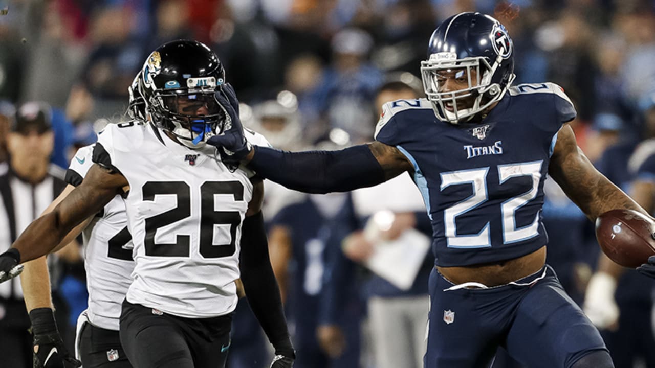 PHOTOS: Derrick Henry stiff-arms at Alabama