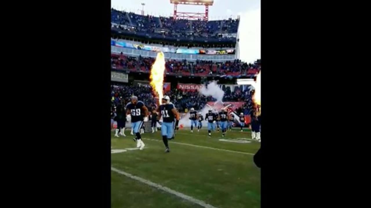 Chicago Bears linebacker Trevis Gipson runs out of the team tunnel