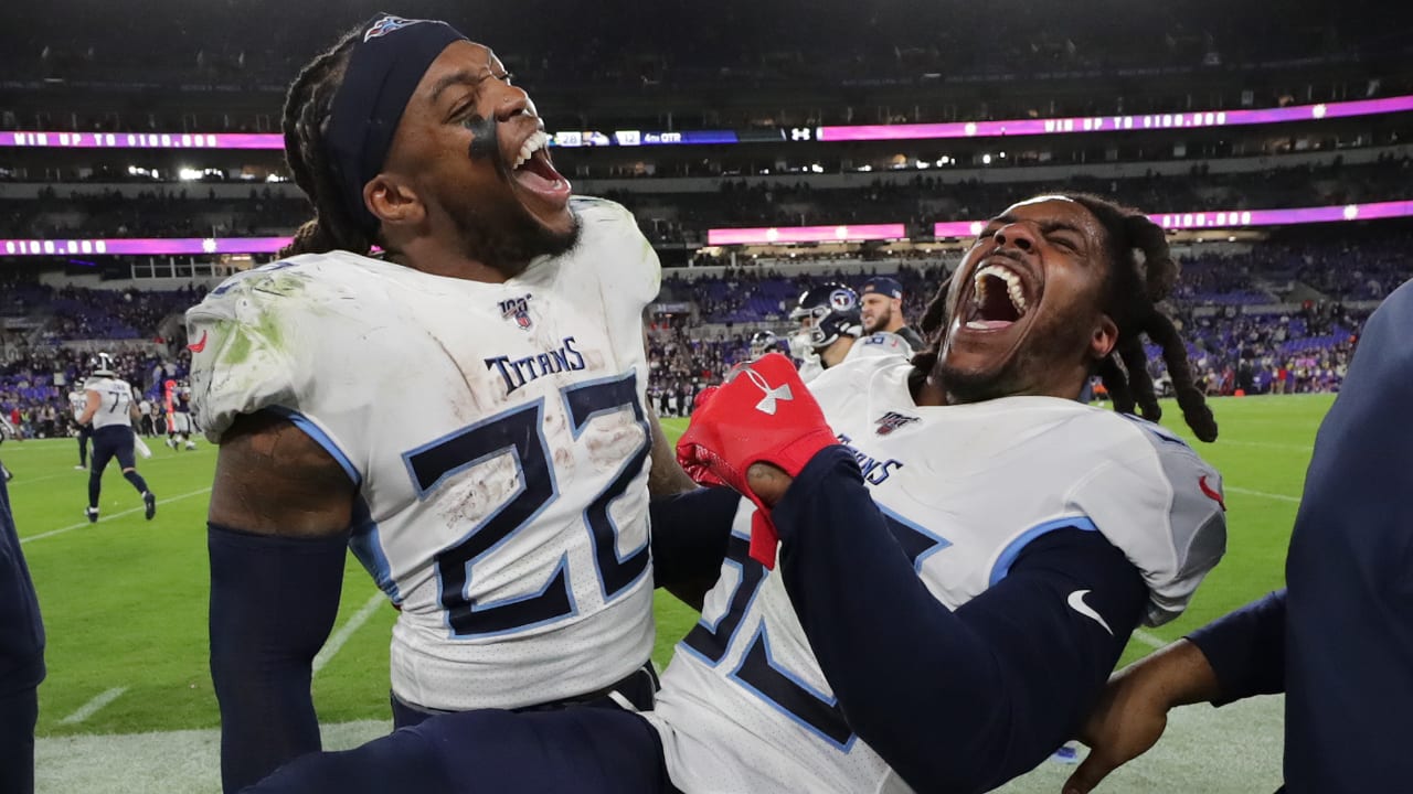 Ravens players dance on Titans' logo after fourth-quarter INT