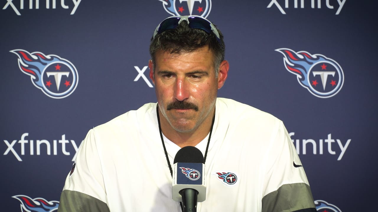 Tennessee Titans head coach Mike Vrabel is greeted by Annabelle