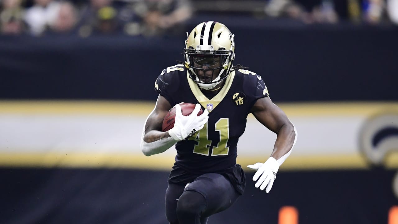 New Orleans Saints running back Alvin Kamara (41) and outside linebacker  Demario Davis (56) celebrate a win after an NFL football game against the  Green Bay Packers, Sunday, Sep. 12, 2021, in