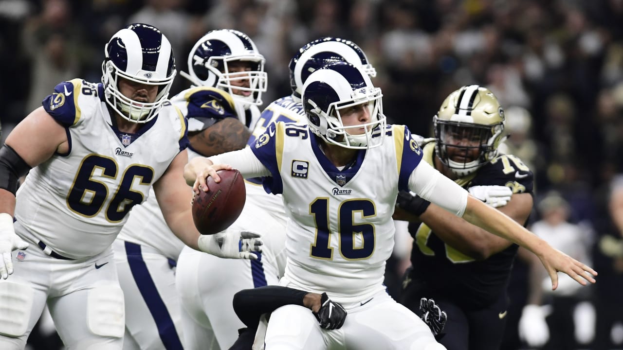 Los Angeles Rams quarterback Jared Goff wears an NFC Champions hat