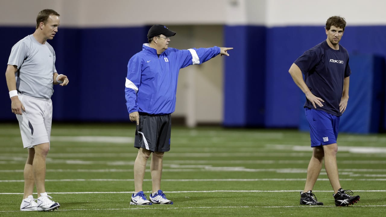 Eli Manning and Daniel Jones help with Girls Flag Football clinic