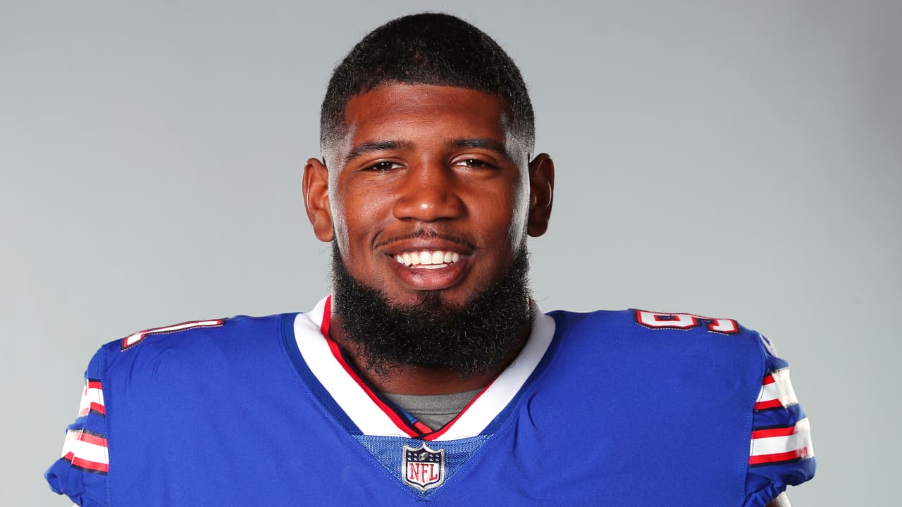 Buffalo Bills defensive tackle Tim Settle (99) and Bills defensive tackle  Ed Oliver (91) talk to a TV camera after beating the Kansas City Chiefs in  an NFL football game, Sunday, Oct.