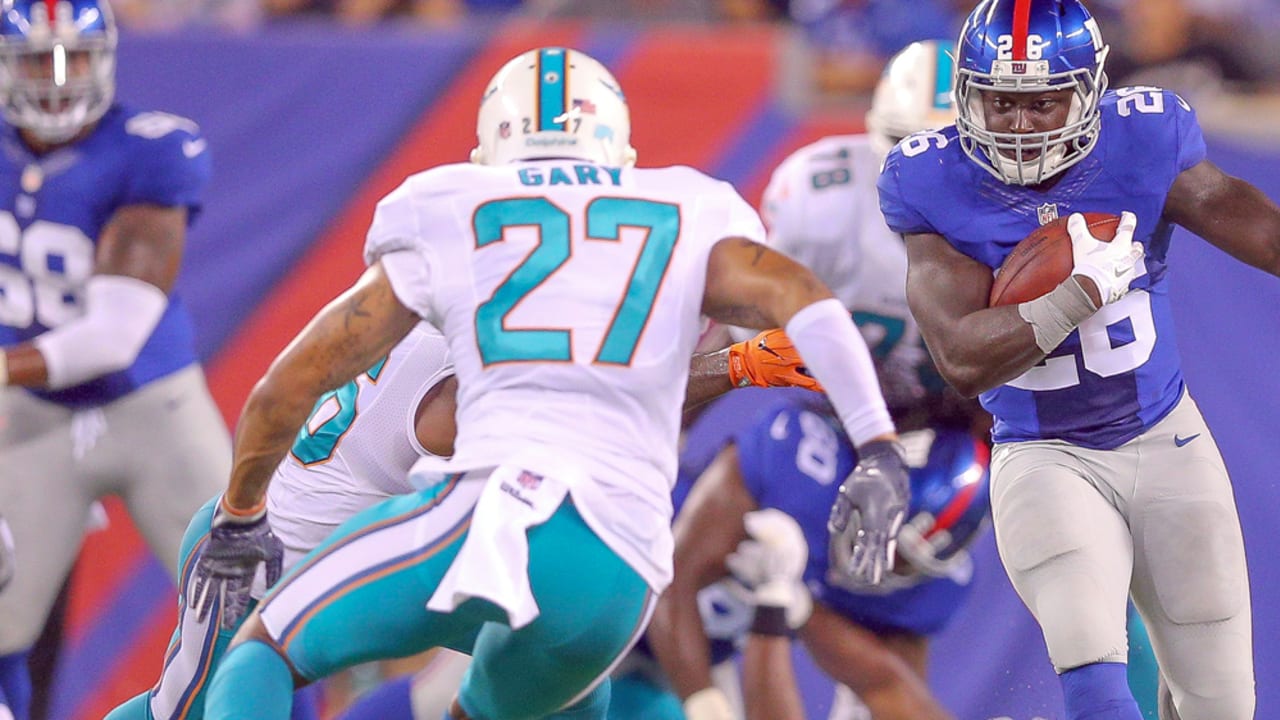 Buffalo Bills safety Gary Shamiel, left, and Cleveland Browns