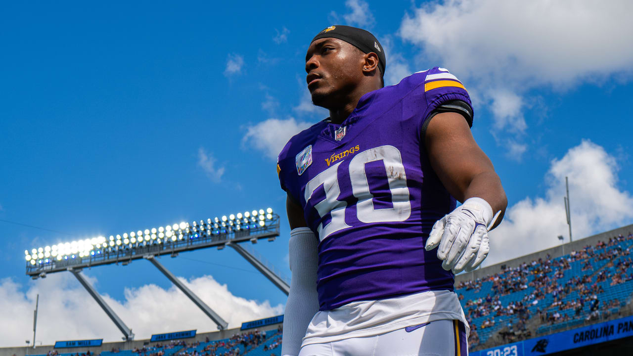 Minnesota Vikings fullback C.J. Ham (30) walks off the field after