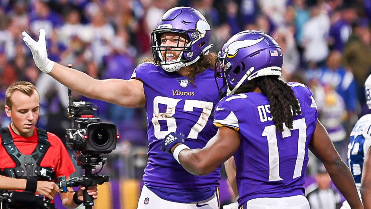 Minnesota Vikings tight end T.J. Hockenson (87) running with the ball  before the start of an