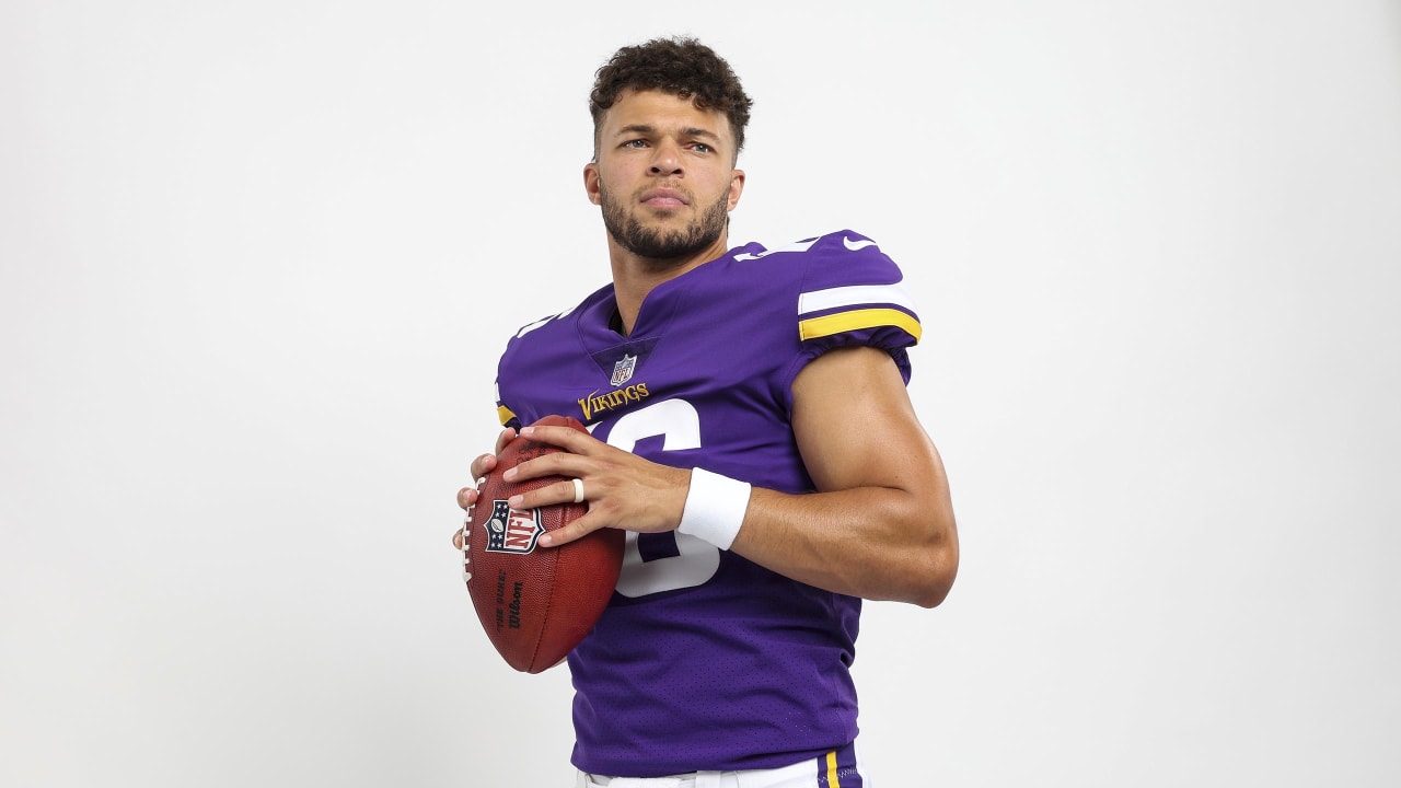 Minnesota Vikings quarterback Jaren Hall looks to throw against