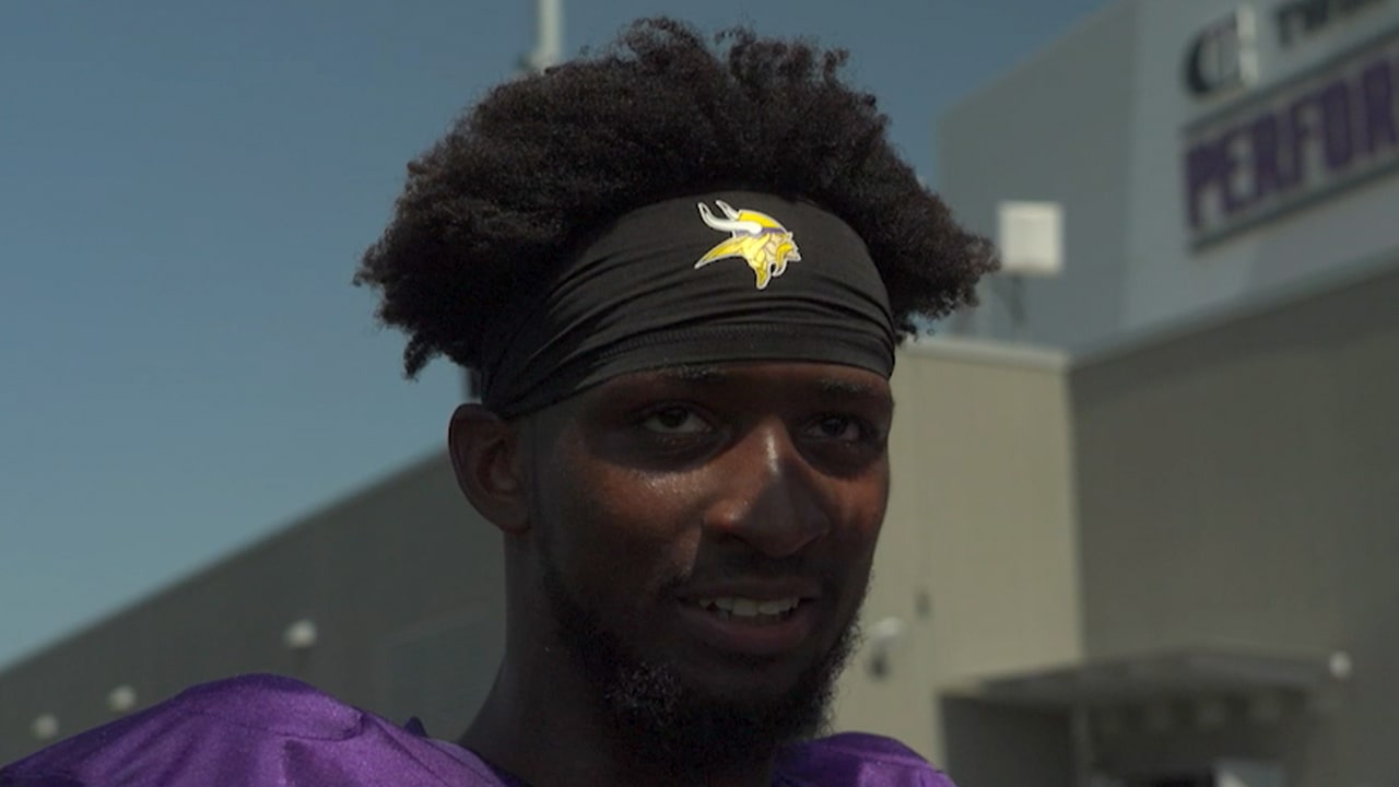 Minnesota Vikings cornerback Akayleb Evans takes part in joint