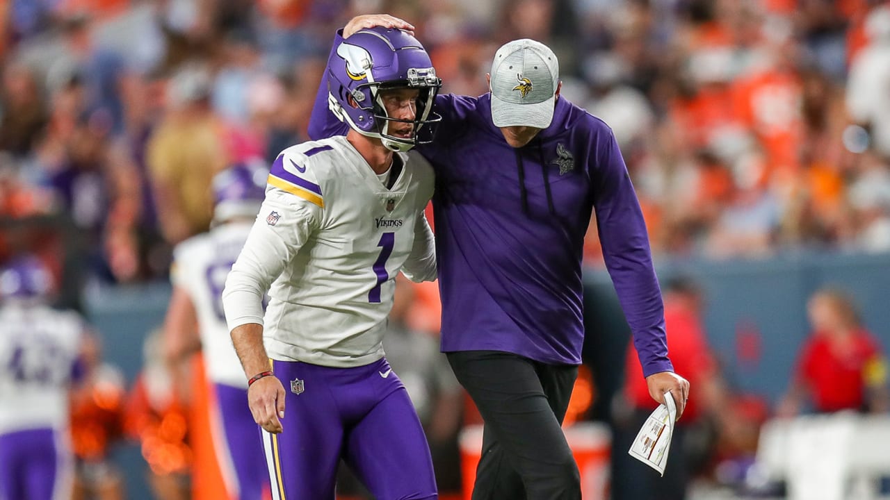 Minnesota Vikings punter Ryan Wright (14) and long snapper Andrew DePaola  (42) chat as they warm-up before an NFL match between Minnesota Vikings and  New Orleans Saints at the Tottenham Hotspur stadium