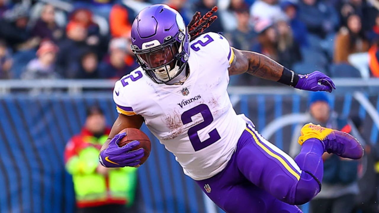 FILE - Minnesota Vikings running back Alexander Mattison (2) breaks a  tackle to score a touchdown in the first quarter of an NFL match between  Minnesota Vikings and New Orleans Saints at