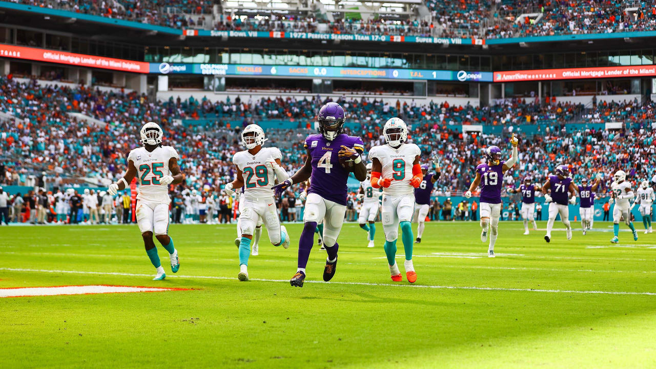 Minnesota Vikings safety Camryn Bynum (24) defends Miami Dolphins wide  receiver Tyreek Hill (10) during the