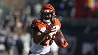 Cincinnati Bengals wide receiver Auden Tate is stopped with the ball by  Oakland Raiders cornerb …