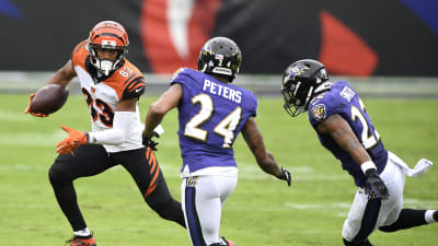 Cincinnati Bengals wide receiver Mike Thomas runs with the ball after  making a catch during the first half of a NFL football game against the  Baltimore Ravens, Sunday, Oct. 9, 2022, in