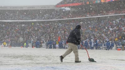 Football games send viewers to TV on cold weekend