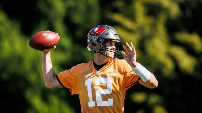 Tom Brady, in Tampa Bay orange, gathers new teammates for workout