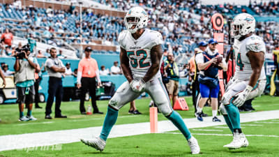 Miami Dolphins linebacker Raekwon McMillan (52) walks the sidelines, during  the second half of an NFL preseason football game against the Tampa Bay  Buccaneers, Thursday, Aug. 9, 2018, in Miami Gardens, Fla. (